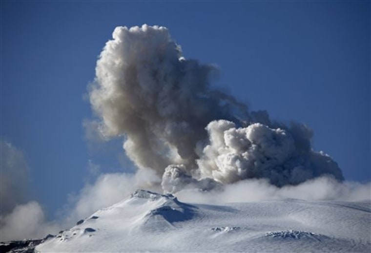A plume of ash, dust and steam emits from a volcano erupting beneath Iceland's Eyjafjallajokull glacier, in this April 21, 2010, photo from Eyjafjallajokull, Iceland. A surge of small earthquakes has been reported around Iceland's Katla volcano.